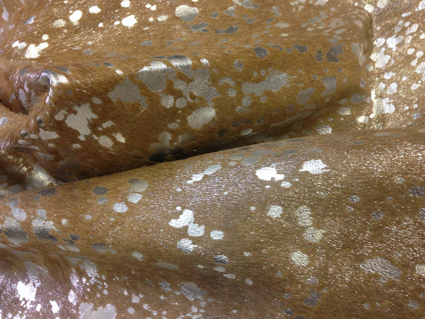 Metallic Silver on Beige Cowhide Rug close up